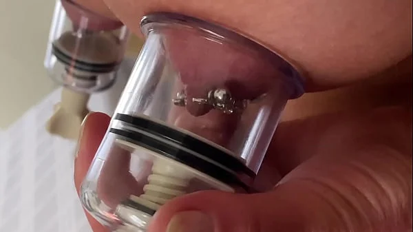 Pumping and Sucking hard my Pierced Nipples