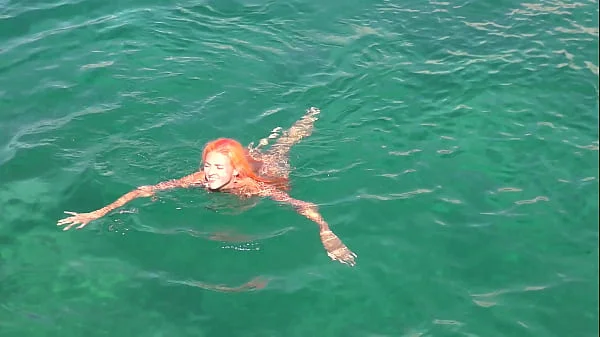 Blue water and a naked girl!