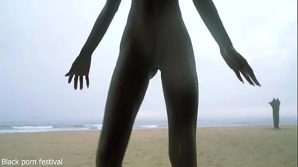 Skinny ebony village girl dancing naked in the rain with her perfect slim body