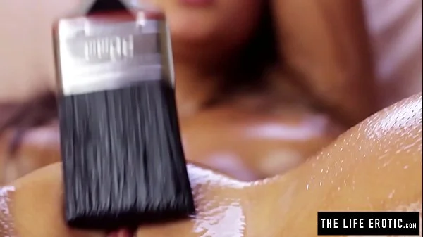 Perfect teen paints herself with oil before masturbating to a hard orgasm