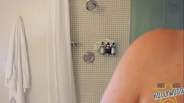 Spying on curvy milf showering