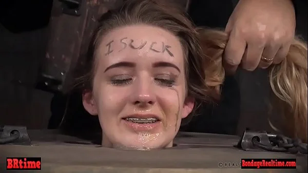 Gagged drooling brunette is dominated