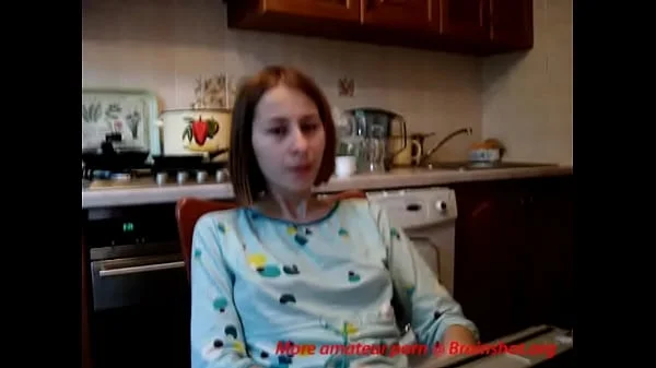 Teenie fingers to orgasm in kitchen