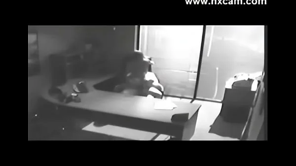 Security camera Films Sex At Office On Desk
