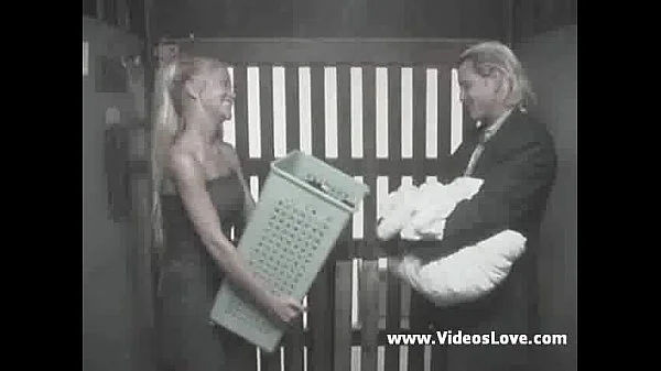 Busty blonde in washing area