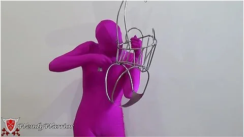 My Iron Maiden Corset Is Locked Over A Pink Zentai