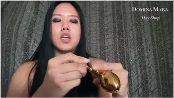Dominatrix Mara Introduces Chastity Devices + Cages [link In Comments]