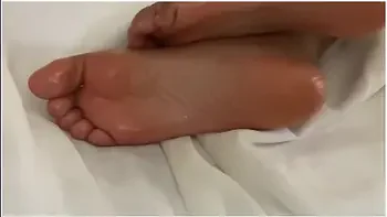 Black Girls Shows Off Her Oily Feet While She Gets Fucked
