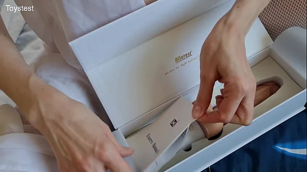 Young Milf Unpacking Bestvibe Thrusting Dildo, this toy could replace her lazy husband.... its alive!!!