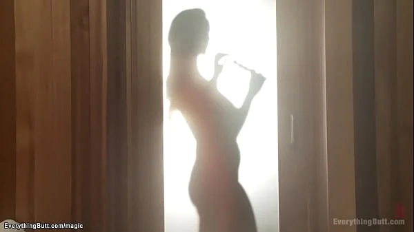 Lesbian threesome anal toying in sauna