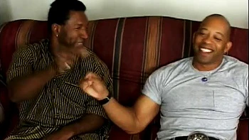 Blonde takes two massive black cocks