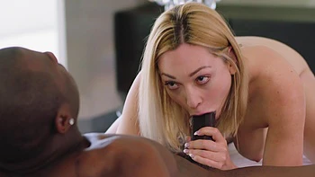 A blonde beauty rides a huge black cock with incredible passion.