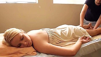 Slim Blondie Relaxes Under Strong Hands Of A Hot Masseur