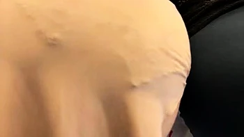 Brunette seductress working her big boobs and hot ass