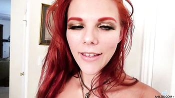 Sexy redhead hottie Devyn Lux nicely plays with her shaved pussy