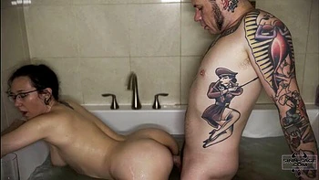 Sex in the bathroom with a passionate inked brunette Sinn Sage