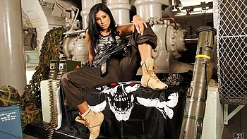 Long-haired angel Anetta Keys is touching her shaved pussy