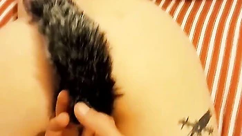 Close-up anal masturbation session and dildo insertion with a hot brunette