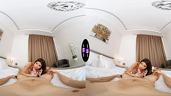 Two sexy babes ride a huge cock in VR