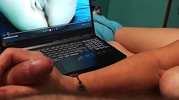 Bella Spanks His Cock While Watching Porn