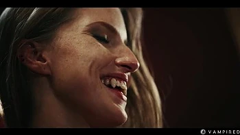 Redhead Vampire Surrenders Pussy to Sonya in Lesbian Fight