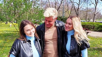 Two girls share his cock in a steamy leather threesome